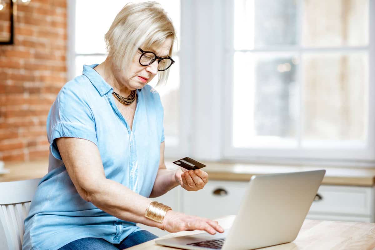 Senior woman shopping online